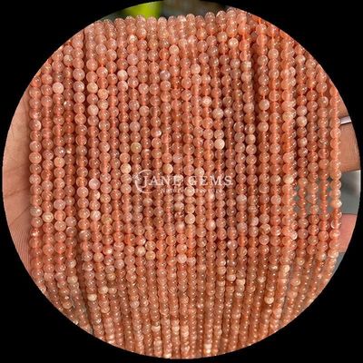 多彩のアメチスト 数珠の糸 丸く磨いた宝石 多彩な結晶石の宝石制作