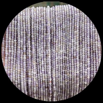 多彩のアメチスト 数珠の糸 丸く磨いた宝石 多彩な結晶石の宝石制作